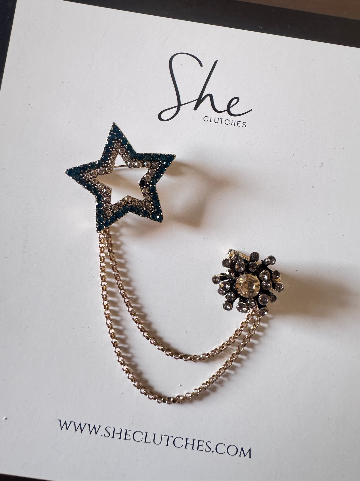 Dangling star Brooch